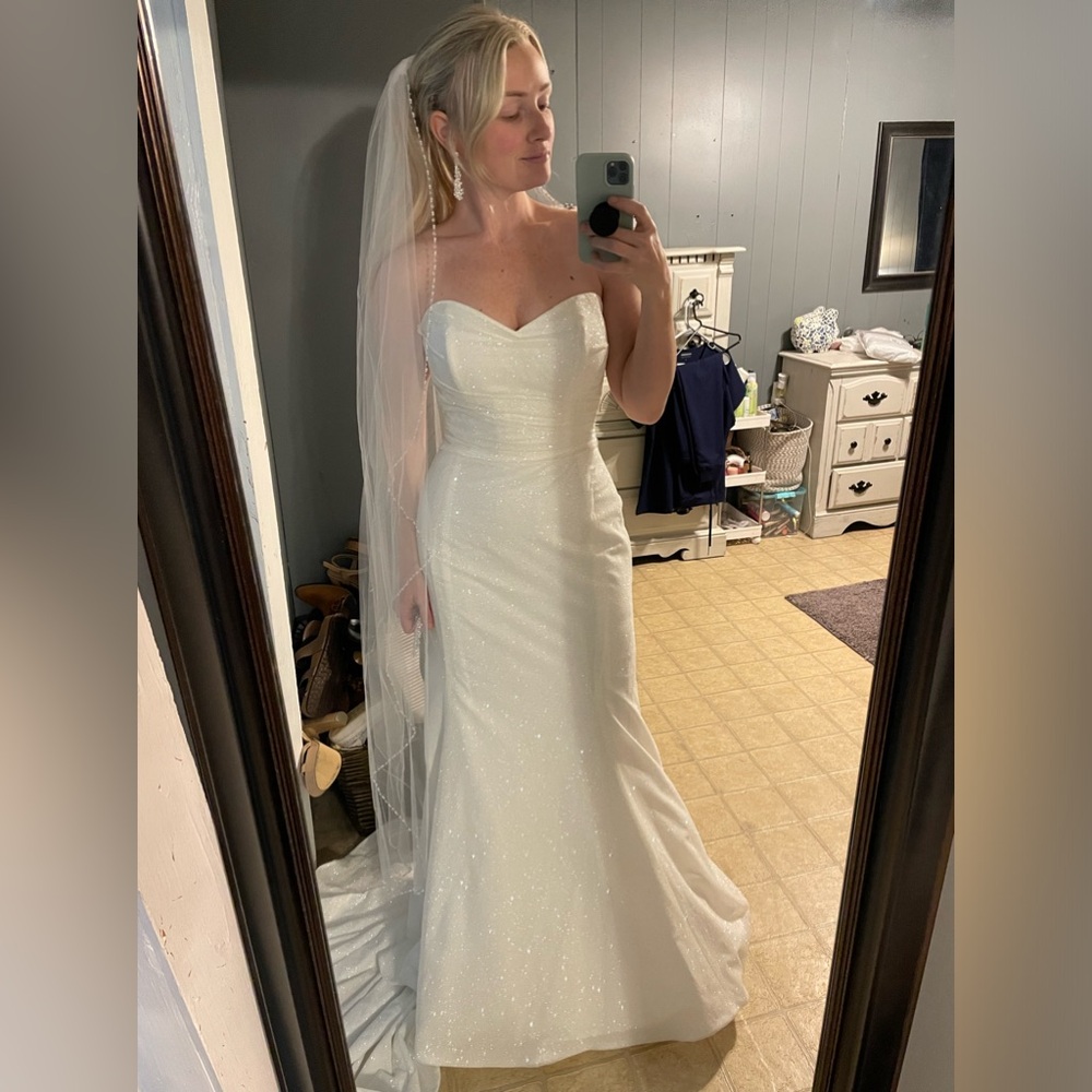 Shimmer strapless ivory wedding gown